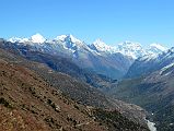13 Looking Back Towards Manang With Kang Guru, Pisang Peak, Manaslu, Ngadi Chuli and Himalchuli Above On Trek From Tilicho Peak Hotel To Tilicho Tal Lake